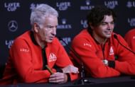 John McEnroe (left)